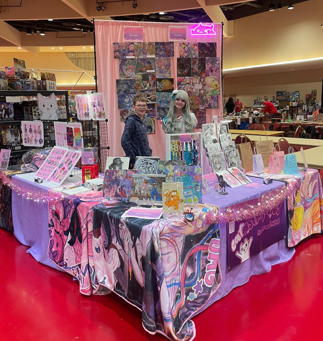 Traditional 2 table setup! (the little boy is not the owner of the booth, he is my brother.)